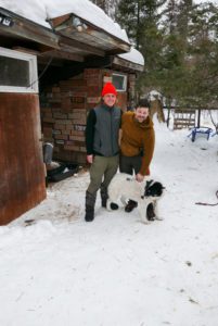 photograph of peter schurke and wystan von duhn with Frasier, a canadian inuit dog